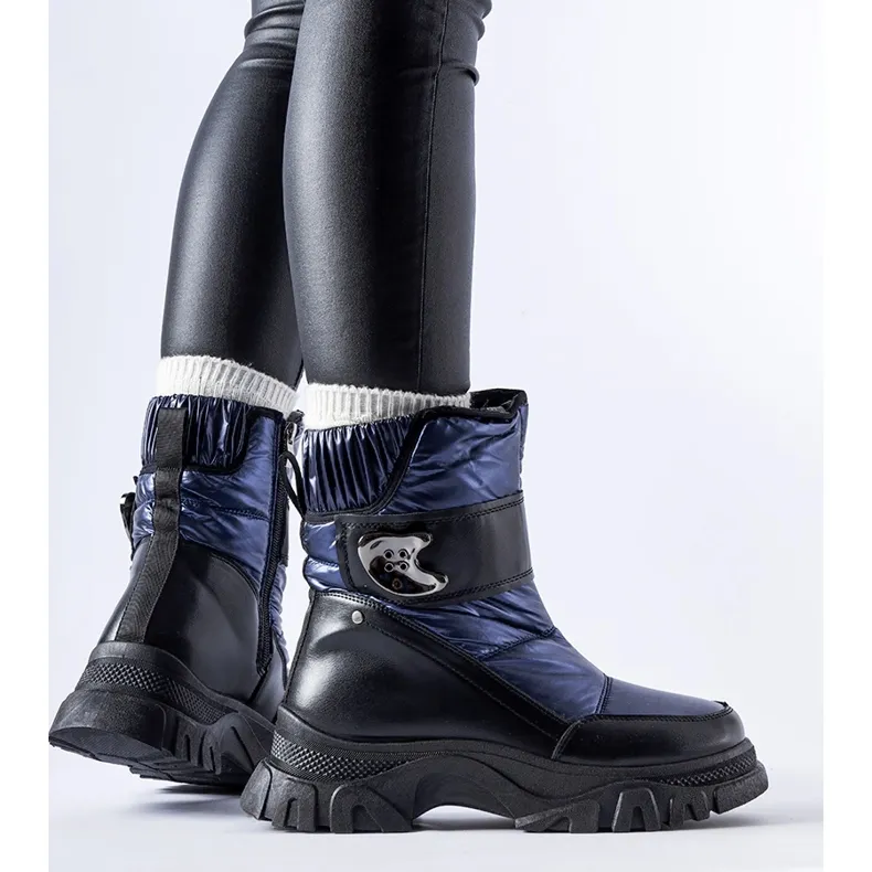 Navy blue snow boots with a massive Carta sole black