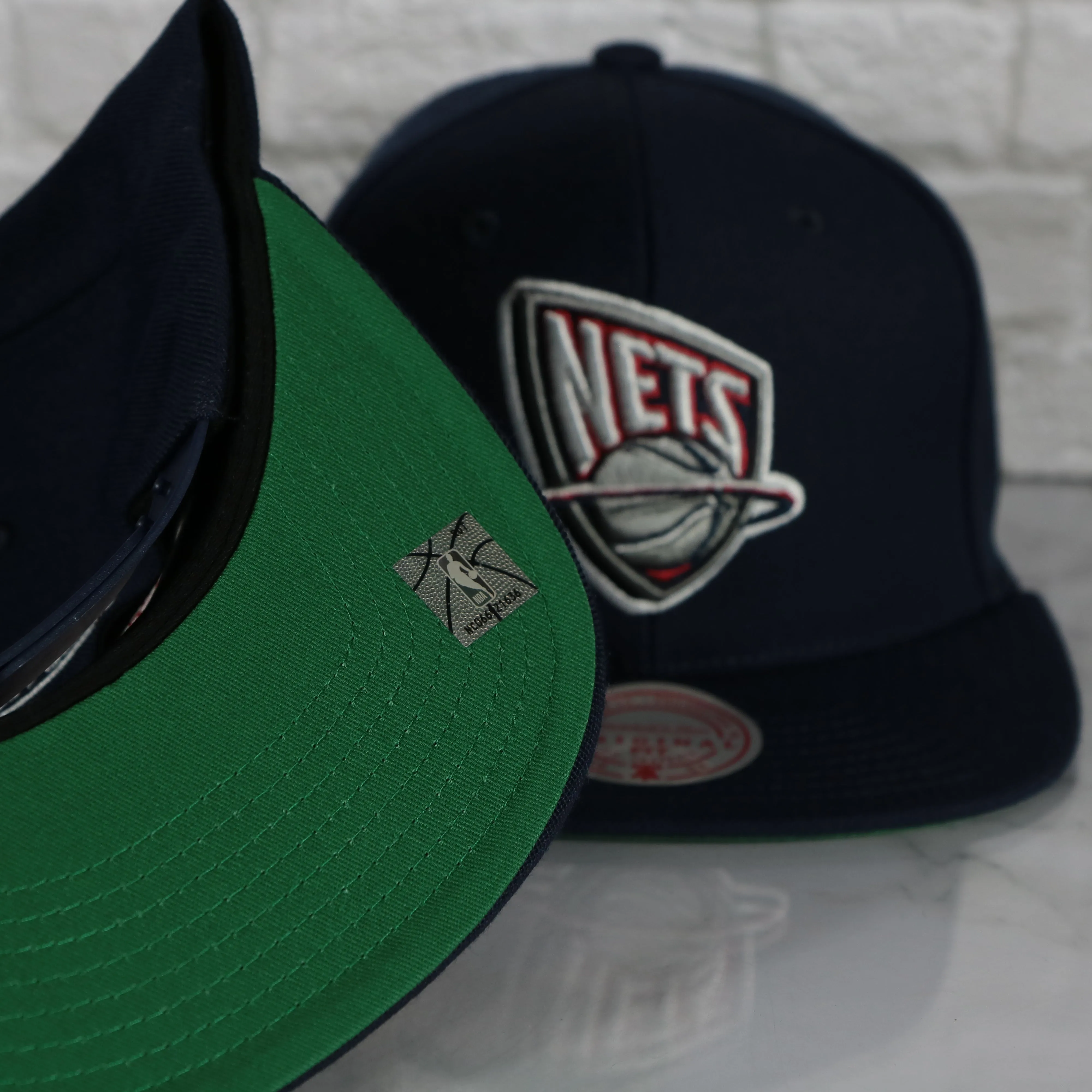 New Jersey Nets Vintage Retro NBA Team Ground 2.0 Mitchell and Ness Snapback Hat | Navy Blue