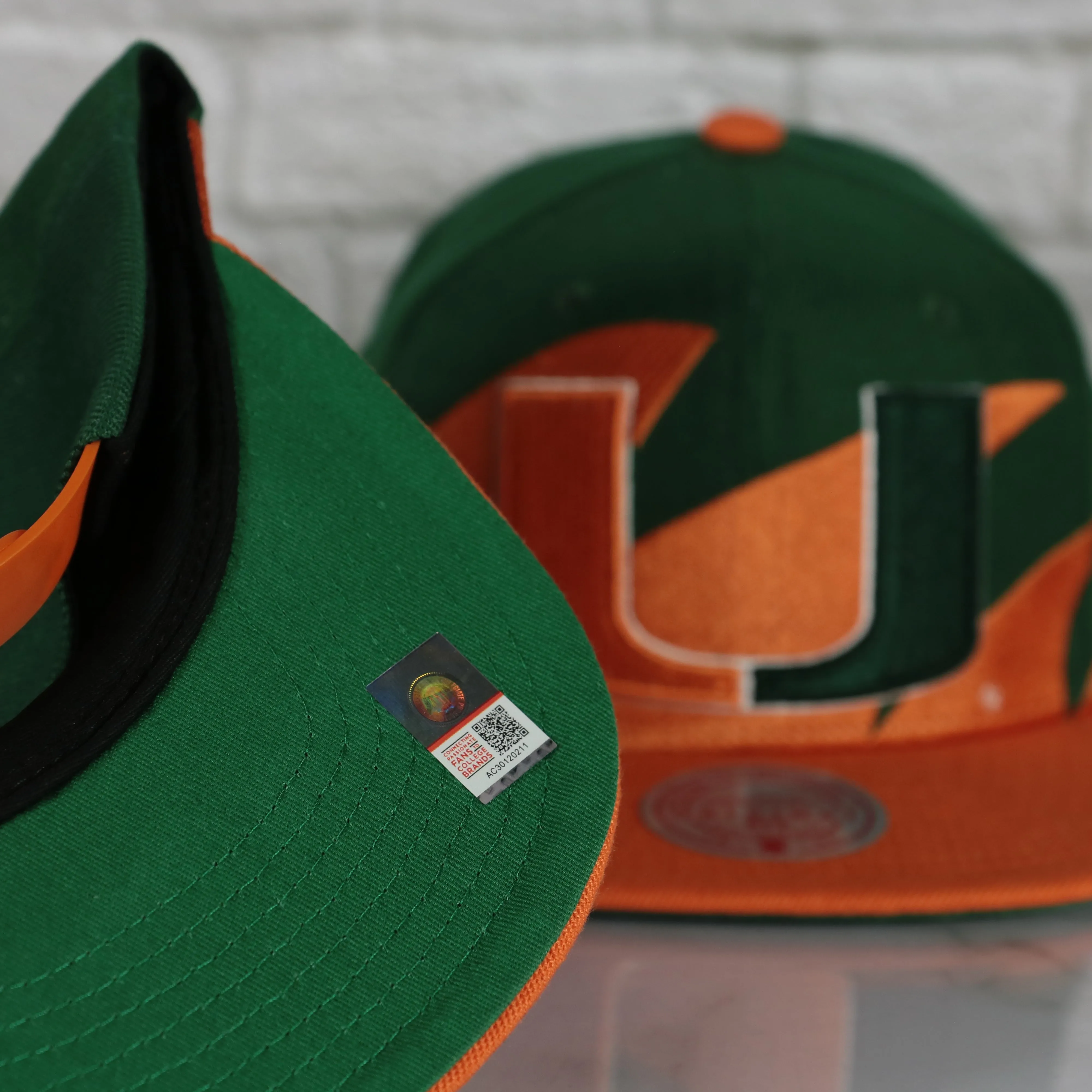 University of Miami Hurricanes Vintage Retro Sharktooth Mitchell and Ness Snapback Hat | Orange/Green